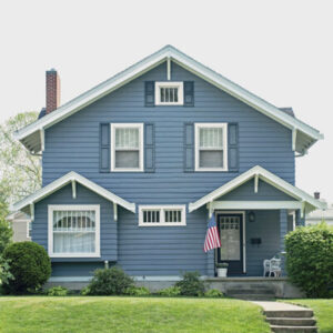 attractive two-story home with blue siding